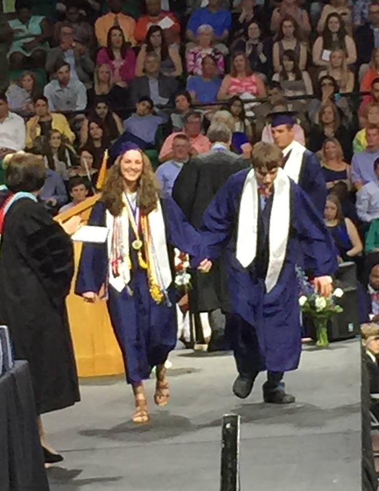 Aly and her twin, Anders, surprised family and friend and walked across the stage to rapturous applause