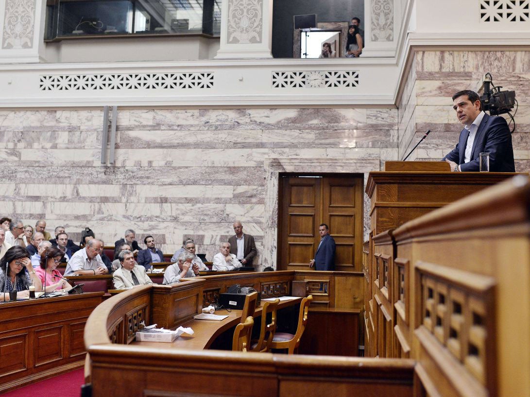 Tspiras addresses a parliamentary group meeting at the Greek Parliament in Athens on June 16, 2015