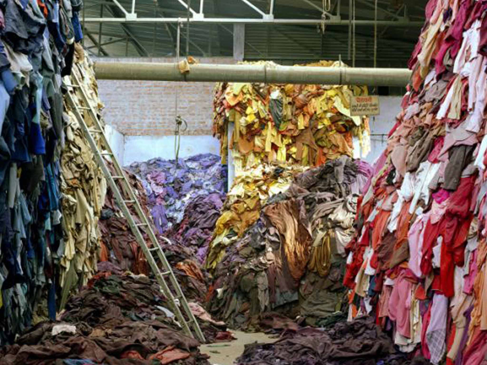 No sweat: clothes are piled up in a warehouse in India