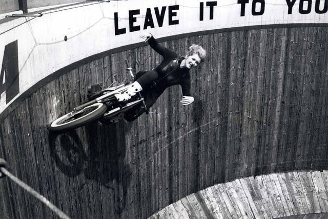 Lady in danger: Yvonne Stagg, who once rode the Wall of Death the day before she was due to give birth, doing what she did best