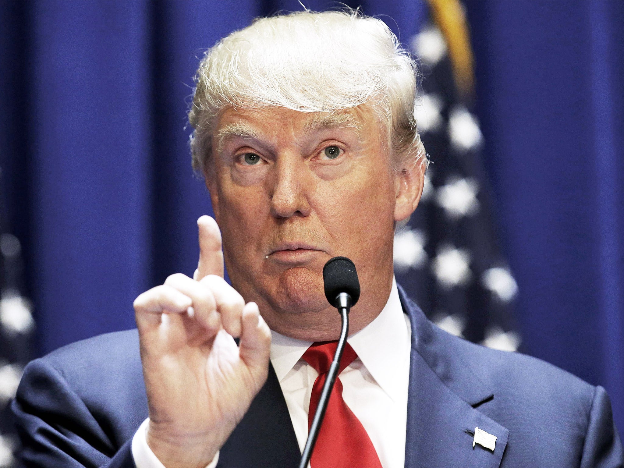 Real estate mogul and TV personality Donald Trump makes a point as he formally announces his campaign for the 2016 Republican presidential nomination
