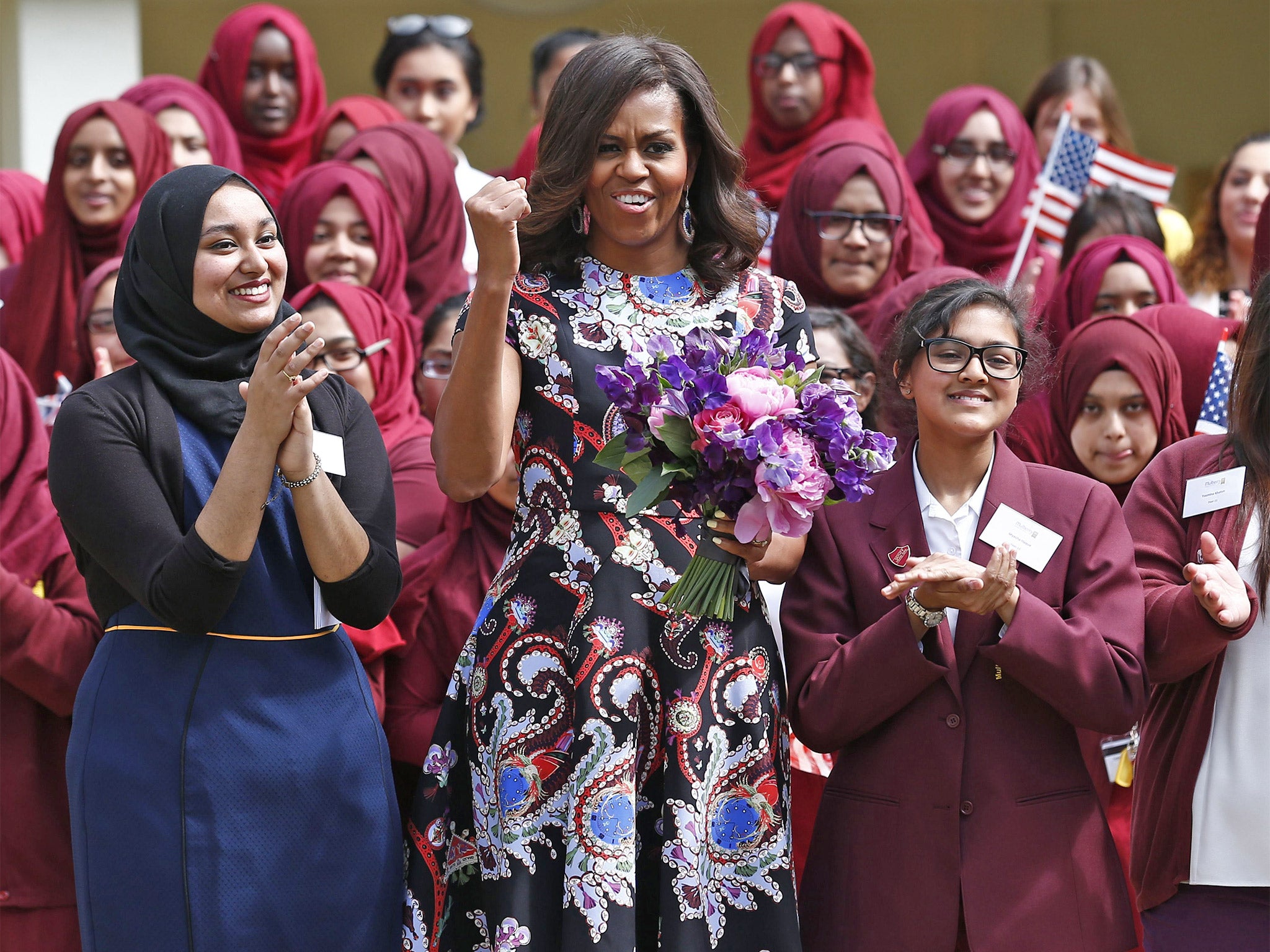 US First Lady Michelle Obama with the girls of Mulberry School for Girls in Tower Hamlets