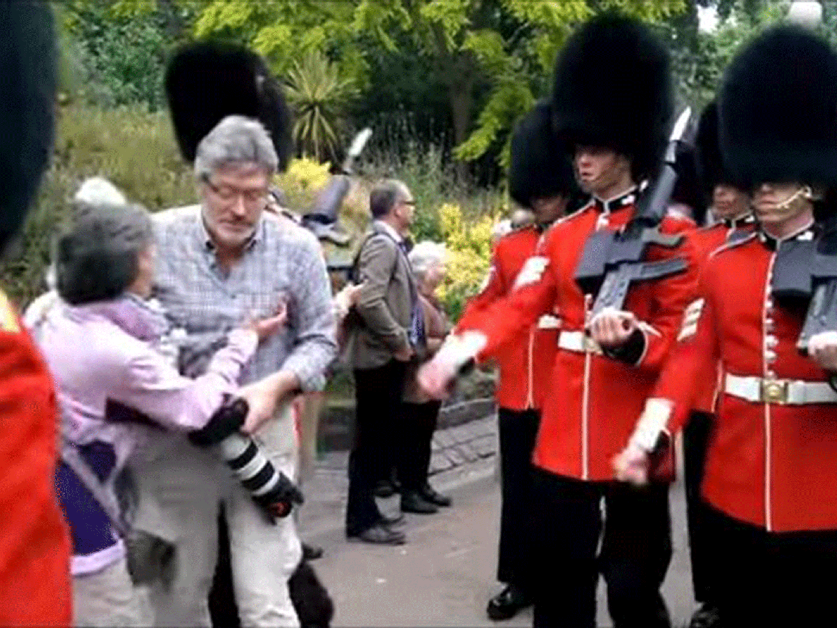 Footage emerges of moment photographer is barged into by Queen's Guards