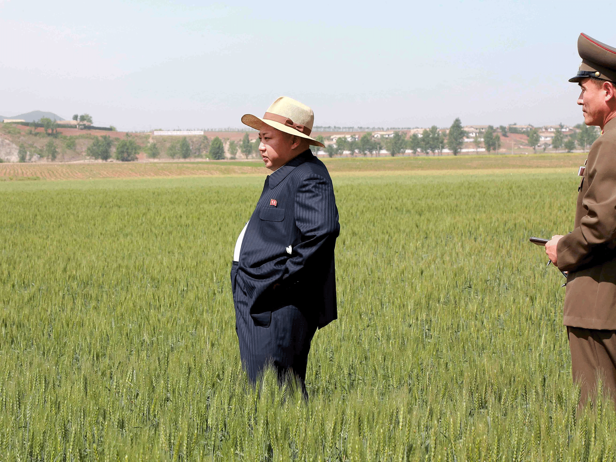 North Korean leader Kim Jong Un visits Farm No. 1116, under KPA (Korean People's Army) Unit 810, in this undated file photo released by North Korea's Korean Central News Agency