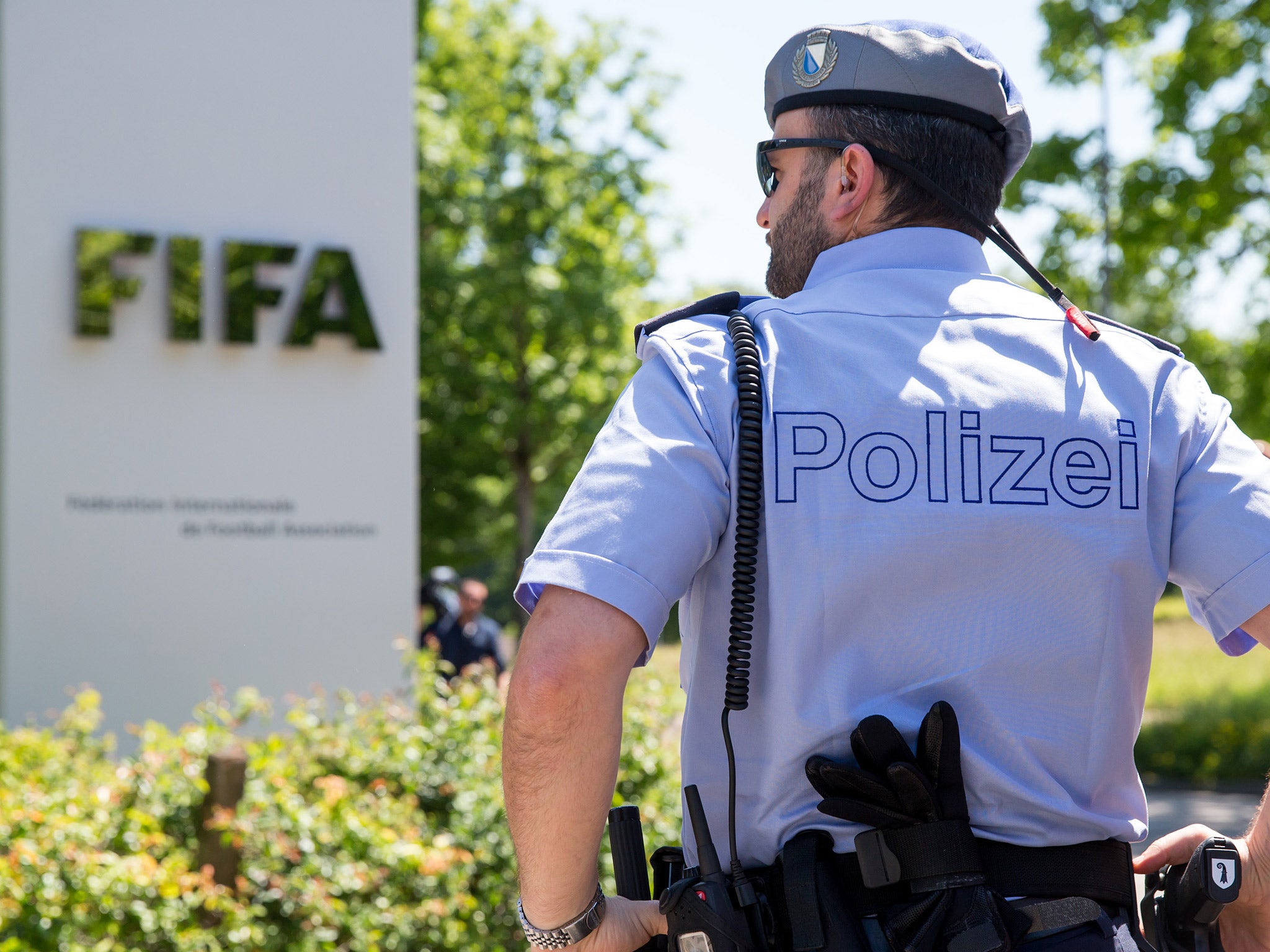 A police officer stands outside Fifa HQ in Zurich