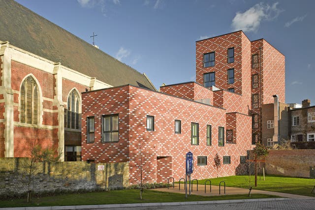 Building around St Mary of Eton Church in east London, architects have created 27 new homes