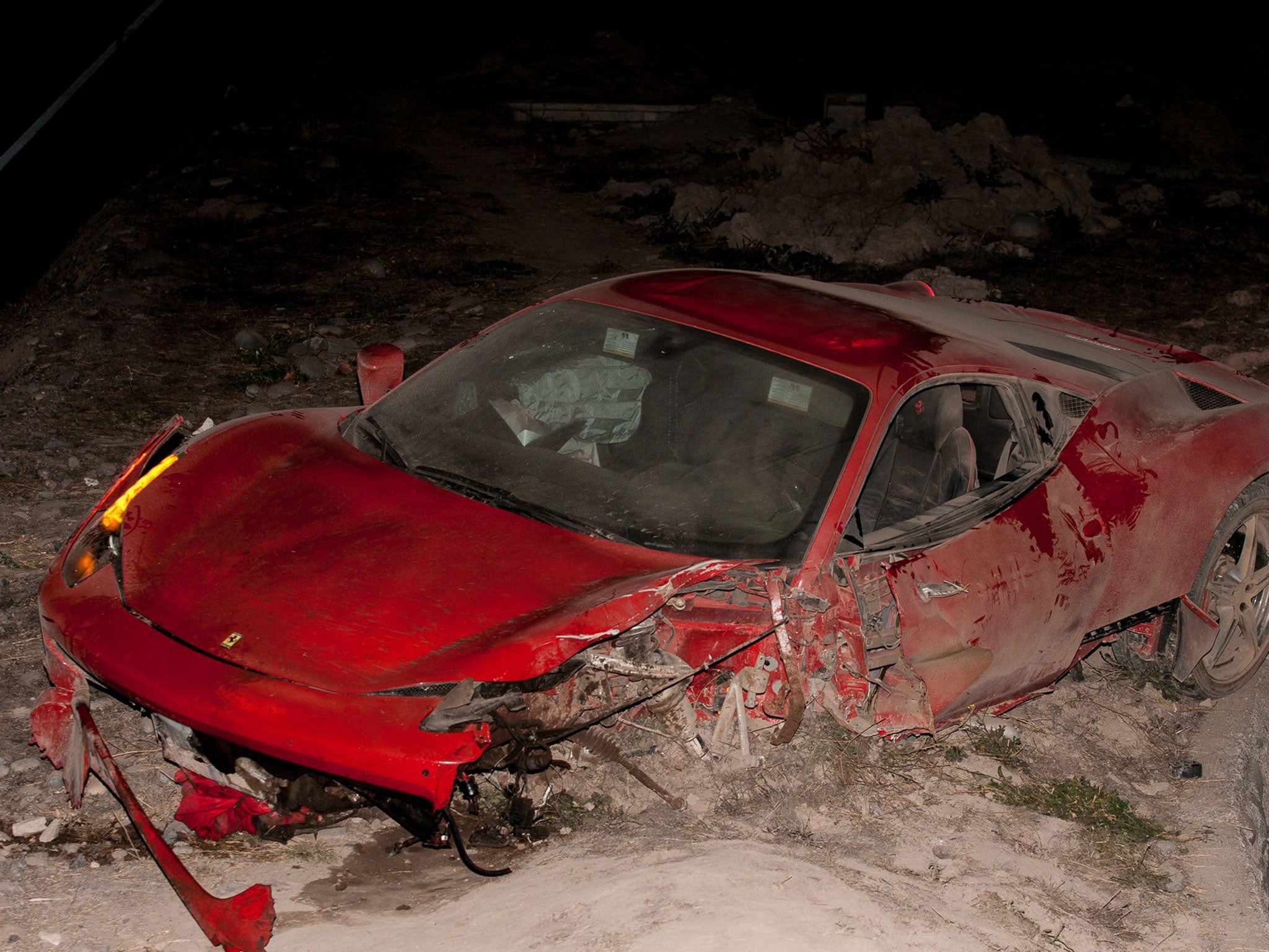 The full extent of the damage to the Ferrari can be seen