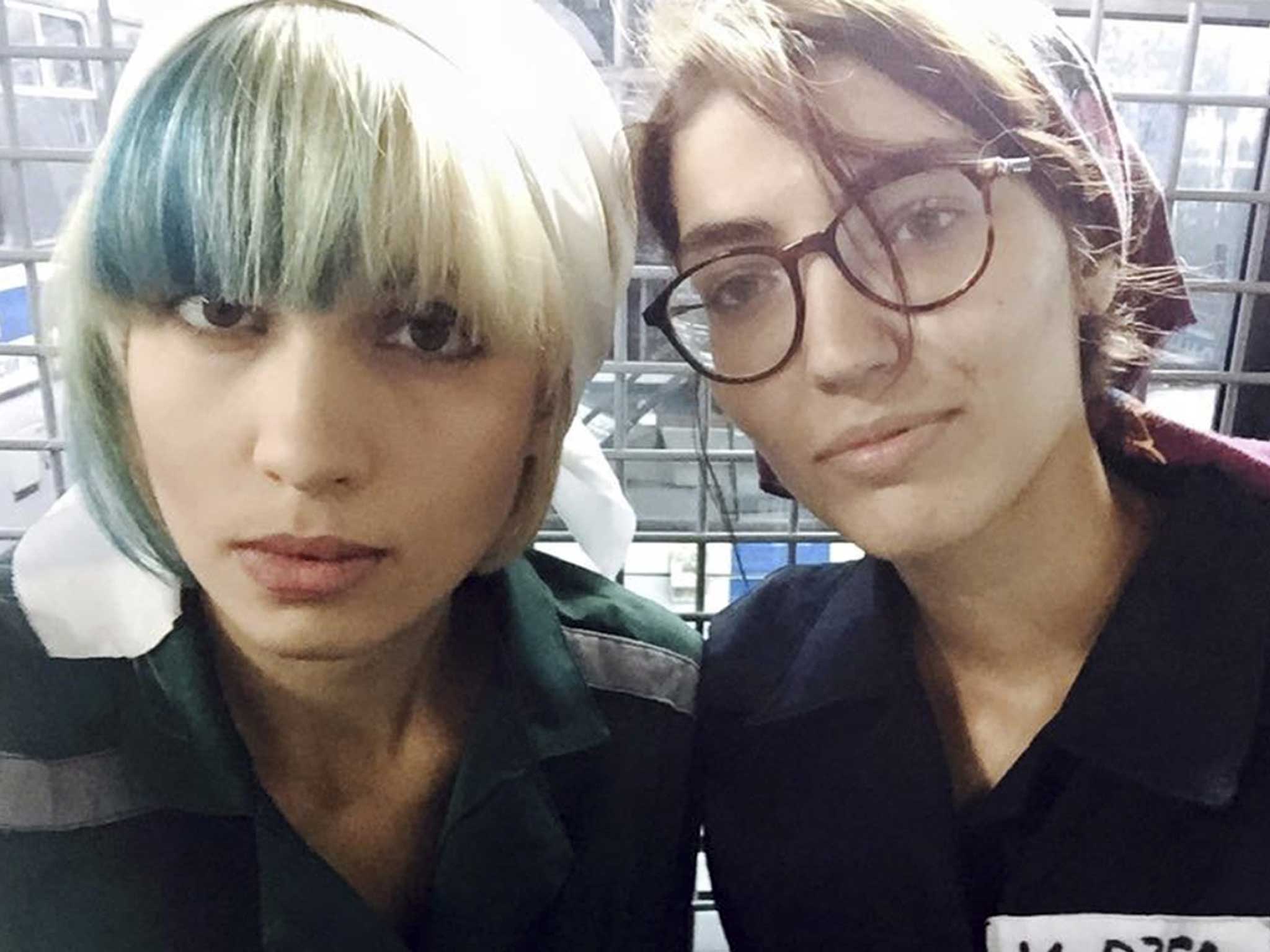 Nadezhda Tolokonnikova (left) and Maria Alyokhina (right) after being arrested earlier this month