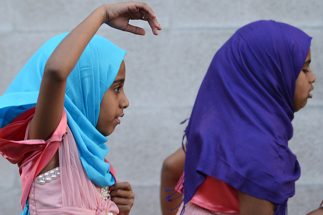 Young girls run at Regent's Park Mosque in London after attending prayers
