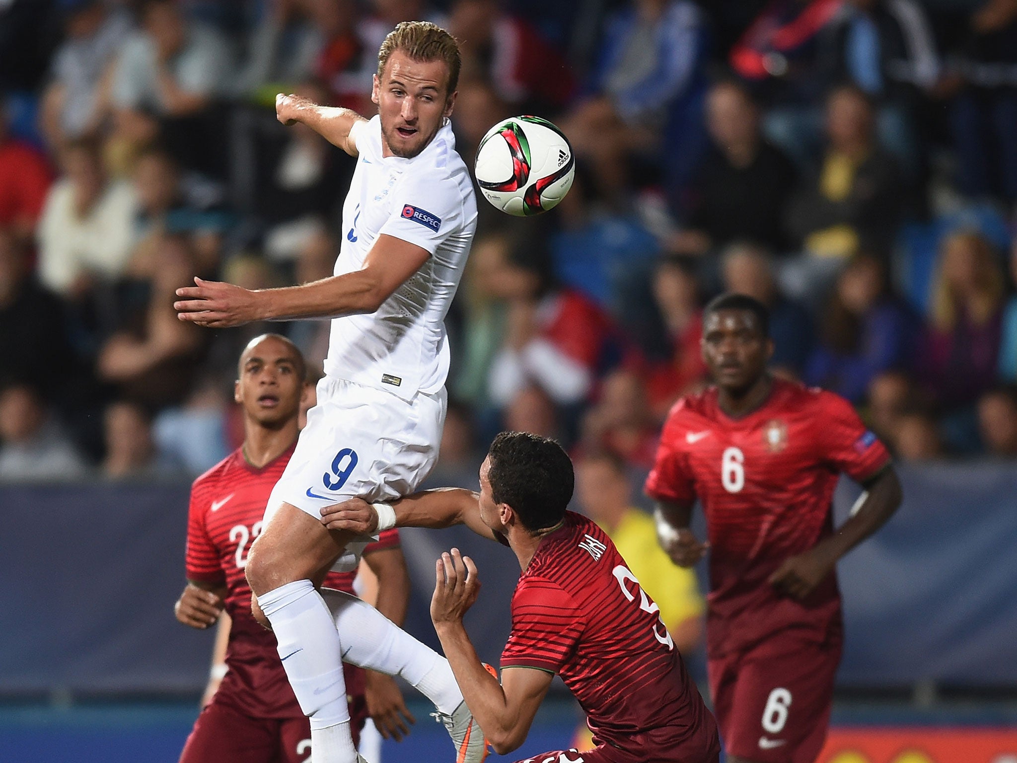 England Under-21 striker Harry Kane heads towards goal during the defeat to Portugal