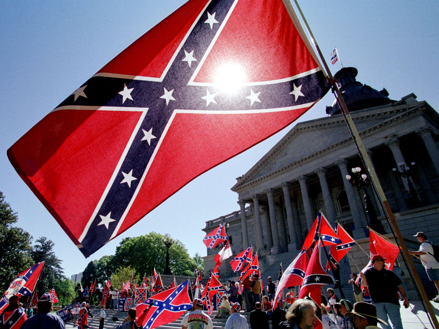 Confederate flag supporters protesting in 2000 as South Carolina considered removing it from the capitol building