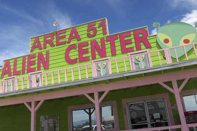 A souvenir shop that houses a brothel in an annex beckons visitors near a junction that leads to Area 51 on July 19, 2014 at Amergosa Valley, Nevada. Area 51 is another name for a portion of Edwards Air Force Base that UFO enthusiasts have theorized contains evidence of visitors from outer space