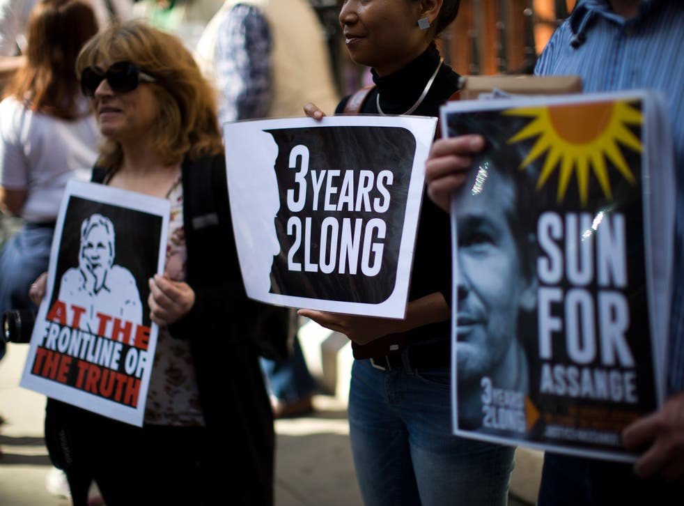 Supporters of the WikiLeaks founder Julian Assange at a protest outside the Ecuadorean embassy yesterday, where he has been holed up for three years