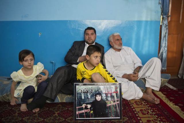 Members of Farkhunda’s family including her father (far right) at their home in Kabul