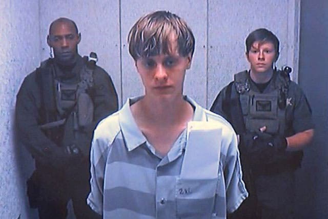 Dylann Roof did not appear to react as he appeared in court via video link