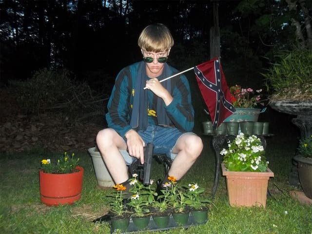 Dylann Roof pictured on the website that also featured a rambling 'manifesto'