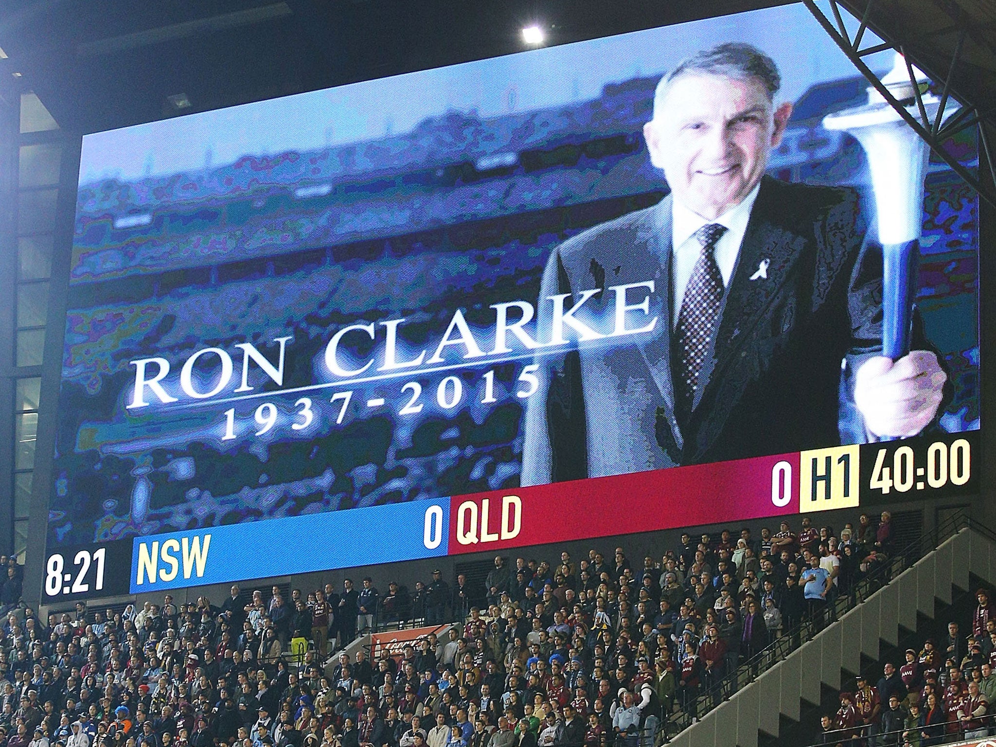 Fans at Australia's State of Origin match stand for a minute's silence for Ron Clarke