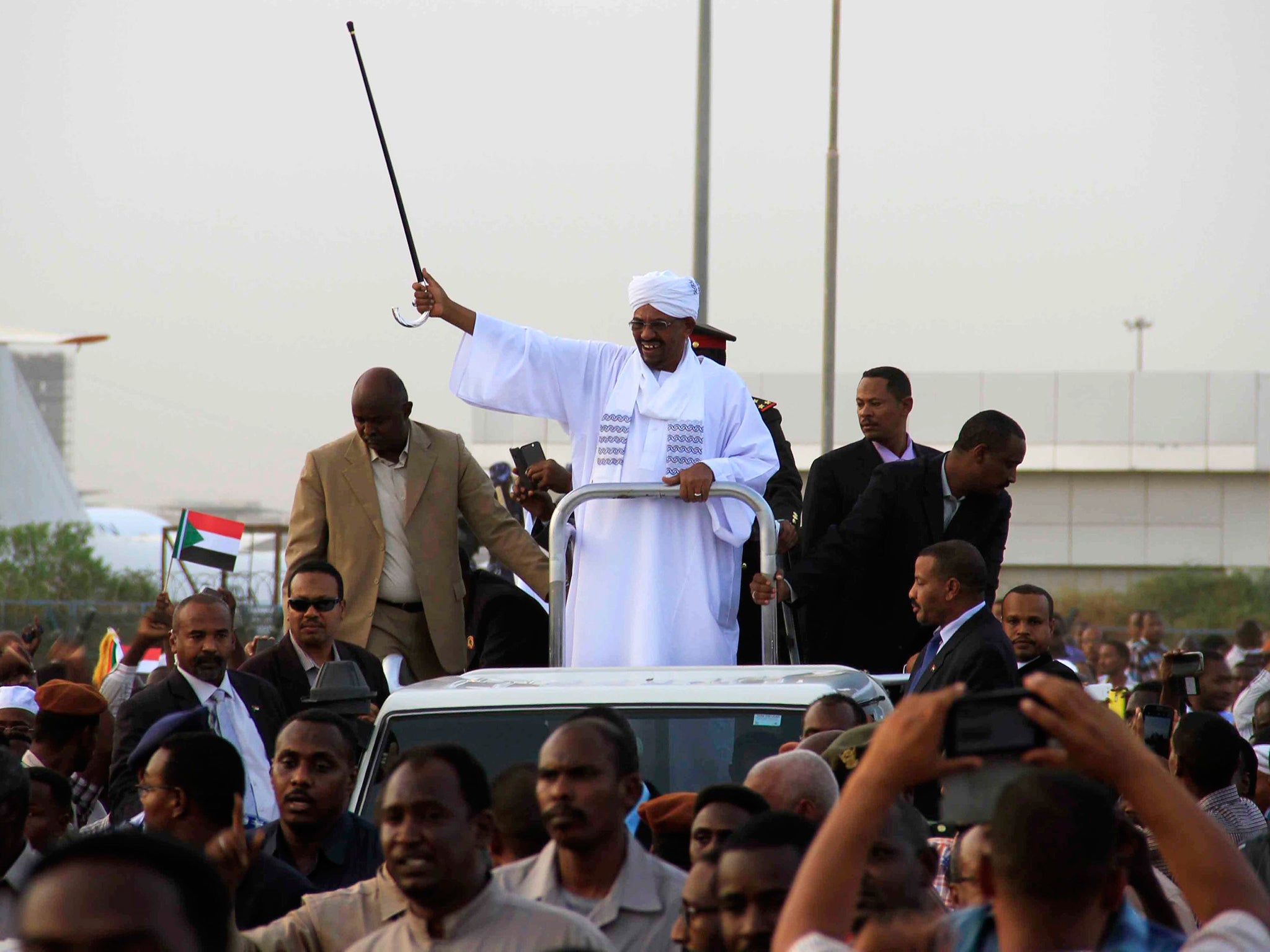 President Omar al-Bashir, on his return to Sudan from South Africa