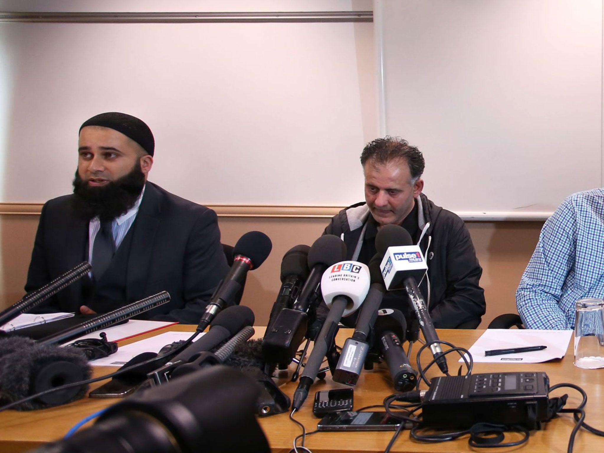 The husbands of three British sisters who disappeared in the Middle East and are feared to have gone to Syria with their nine children broke down in tears Tuesday as they appealed for their families to come home.