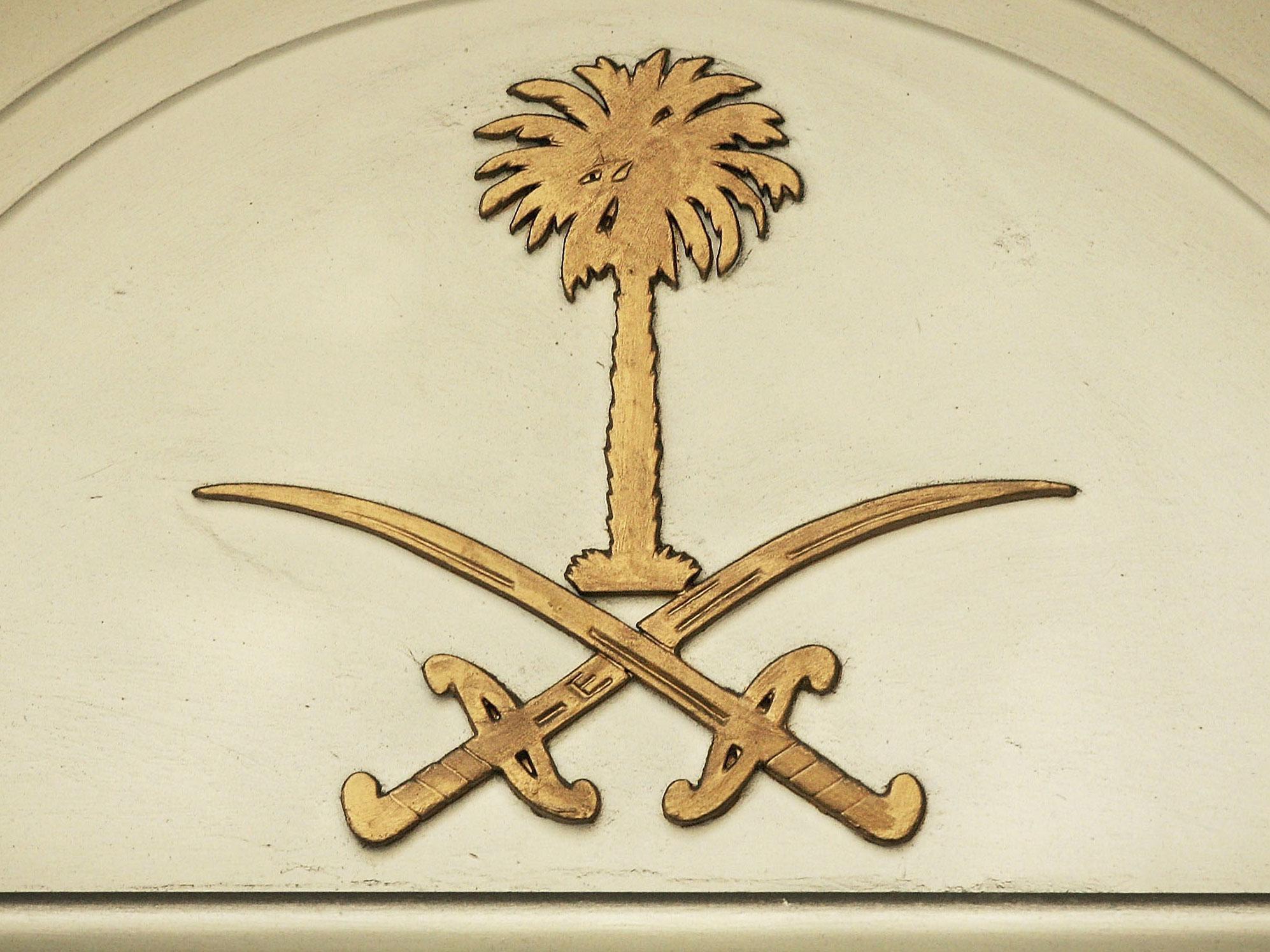 The emblem of Saudi Arabia above the embassy in London