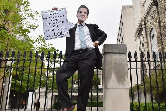 A protester dressed as British Chancellor of the Exchequer George Osborne poses during a demonstration against austerity and spending cuts on June 20, 2015 in London
