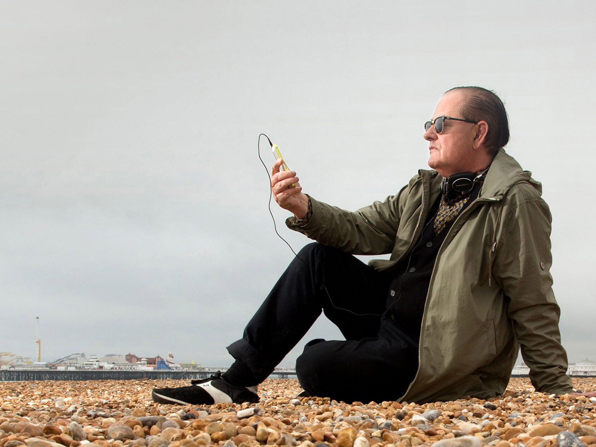 Musician and producer Martyn Ware on Brighton beach, as the public is being asked to record the noises of seashores across the UK in order to build up a 'sound map' of the country's coastline which will be added to the British Library's Sound Archive