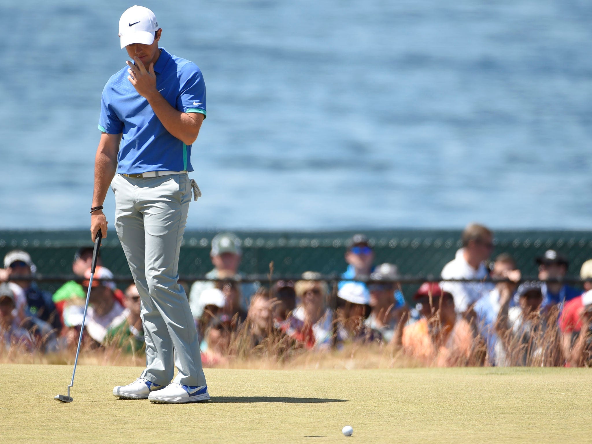 Rory McIlroy cuts a disconsolate figure as another putt gets away at the 17th green