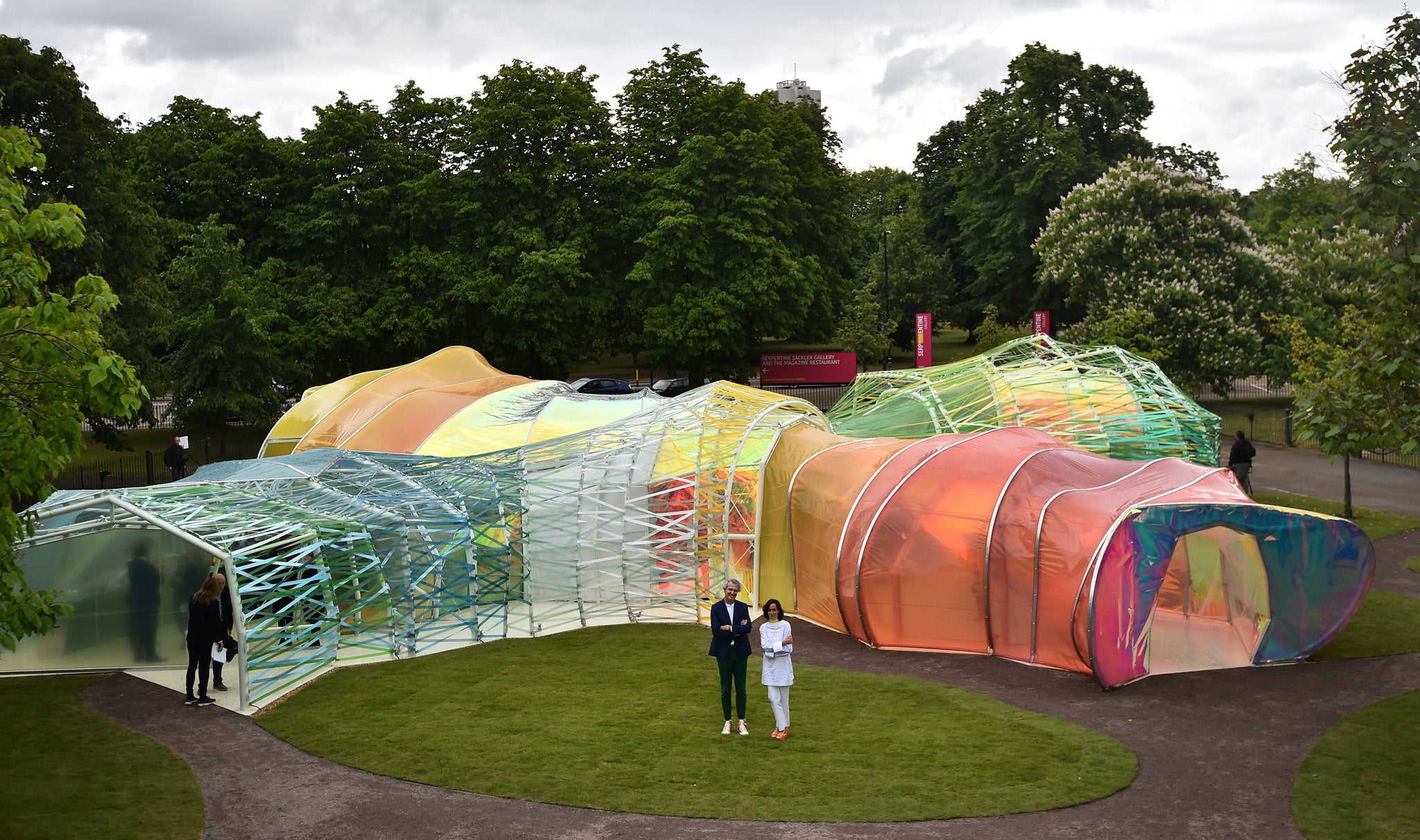 Spanish architects Lucia Cano (R) and Jose Selgas pose by their Serpentine pavilion structure