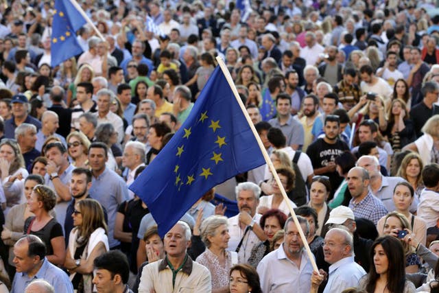 Pro-Euro demonstrators outside the Greek Parliament during a rally in Athens. Thousands of people gathered to show support for the country's future in the EU