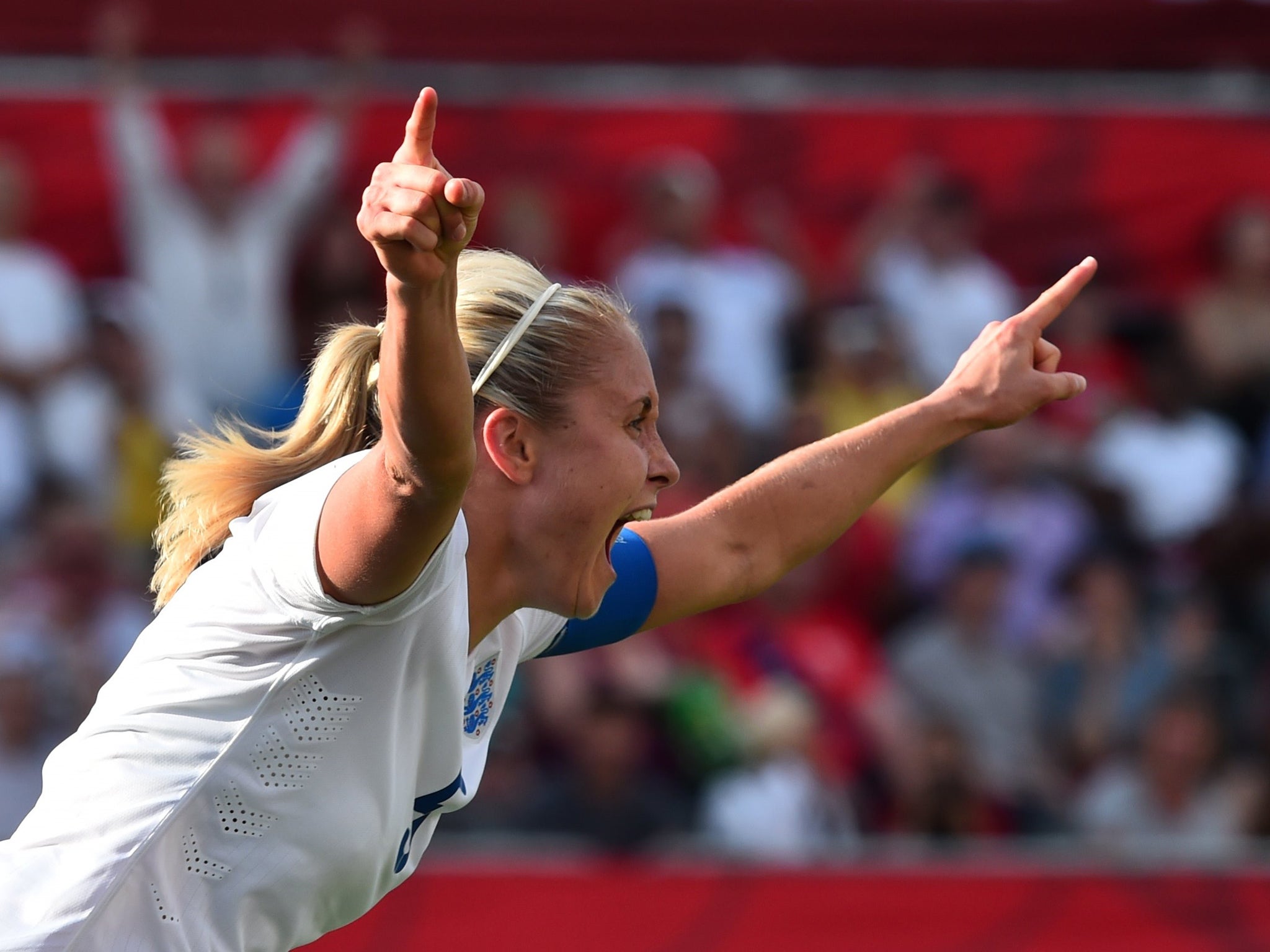 England's Steph Houghton celebrates after scoring the equaliser with a header from a corner