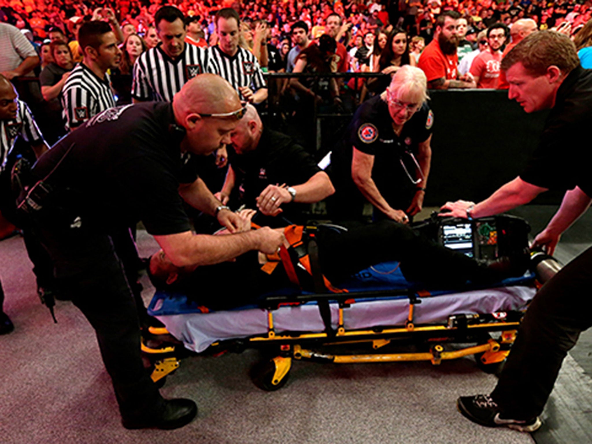 Jamie Noble is treated by WWE medics