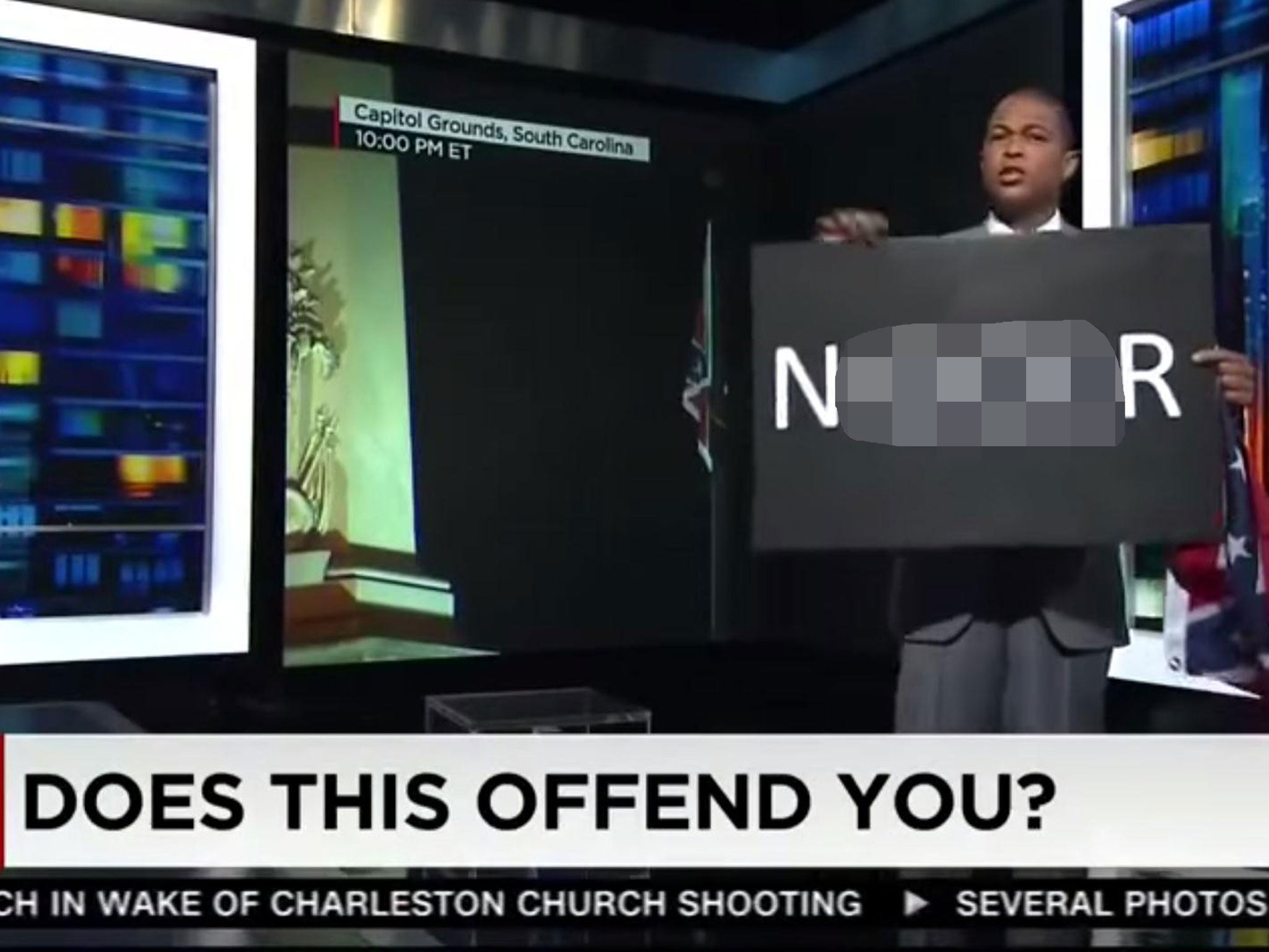 Lemon held up a sign bearing the racial epithet on CNN
