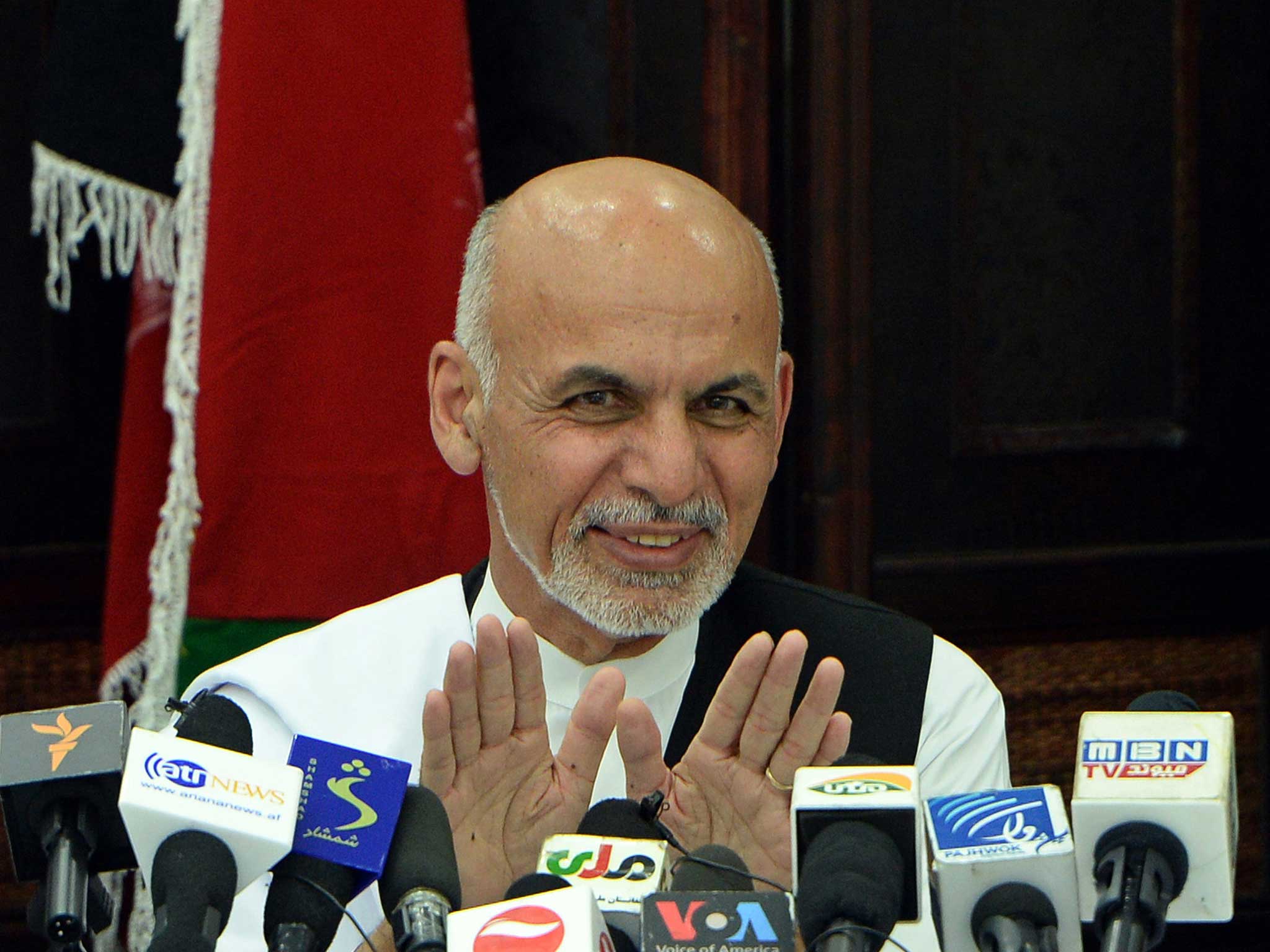 Ashraf Ghani, pictured here during his election campaign, has commended a soldier following the attack on parliament