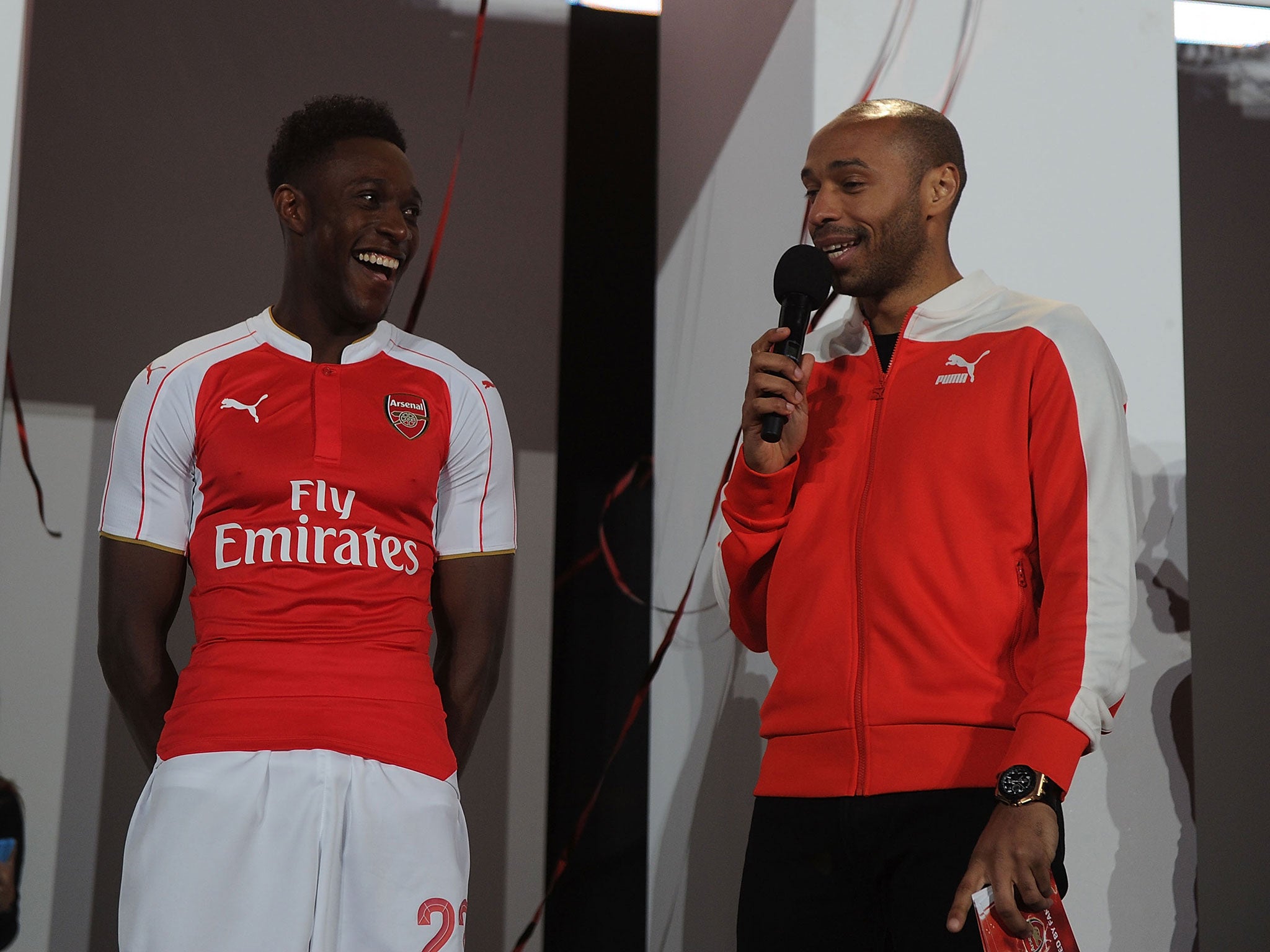 Henry speaks with Danny Welbeck at the Arsenal kit launch