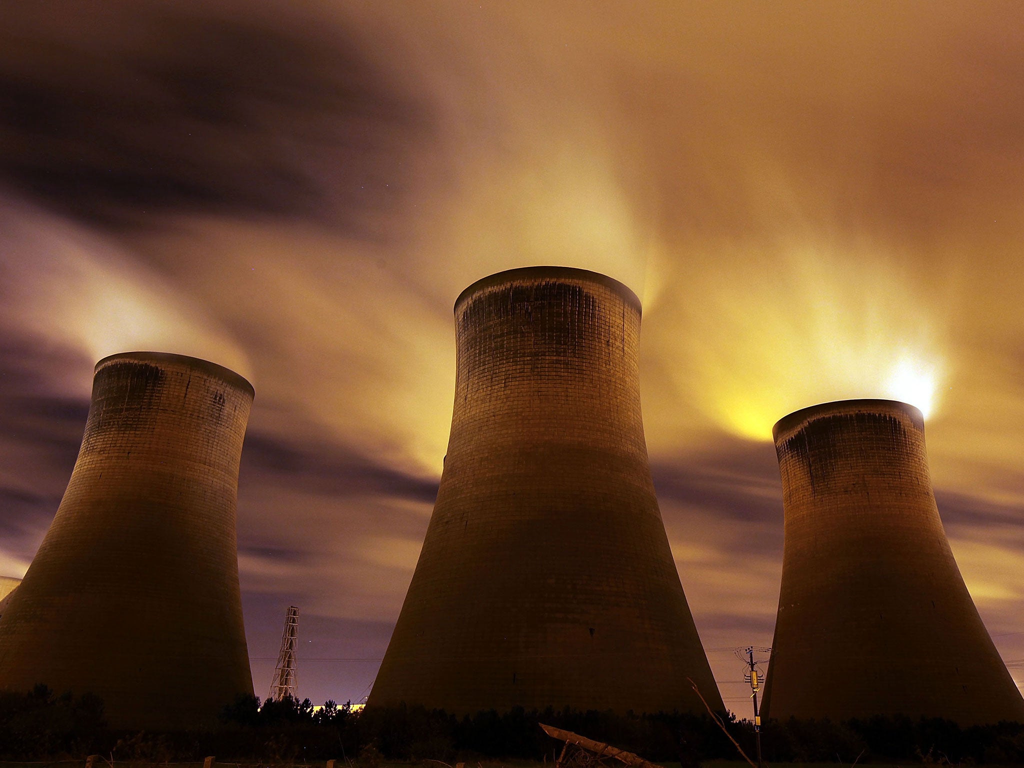 The coal fueled Fiddlers Ferry power station emits vapour into the night sky on November 16, 2009 in Warrington, United Kingdom.