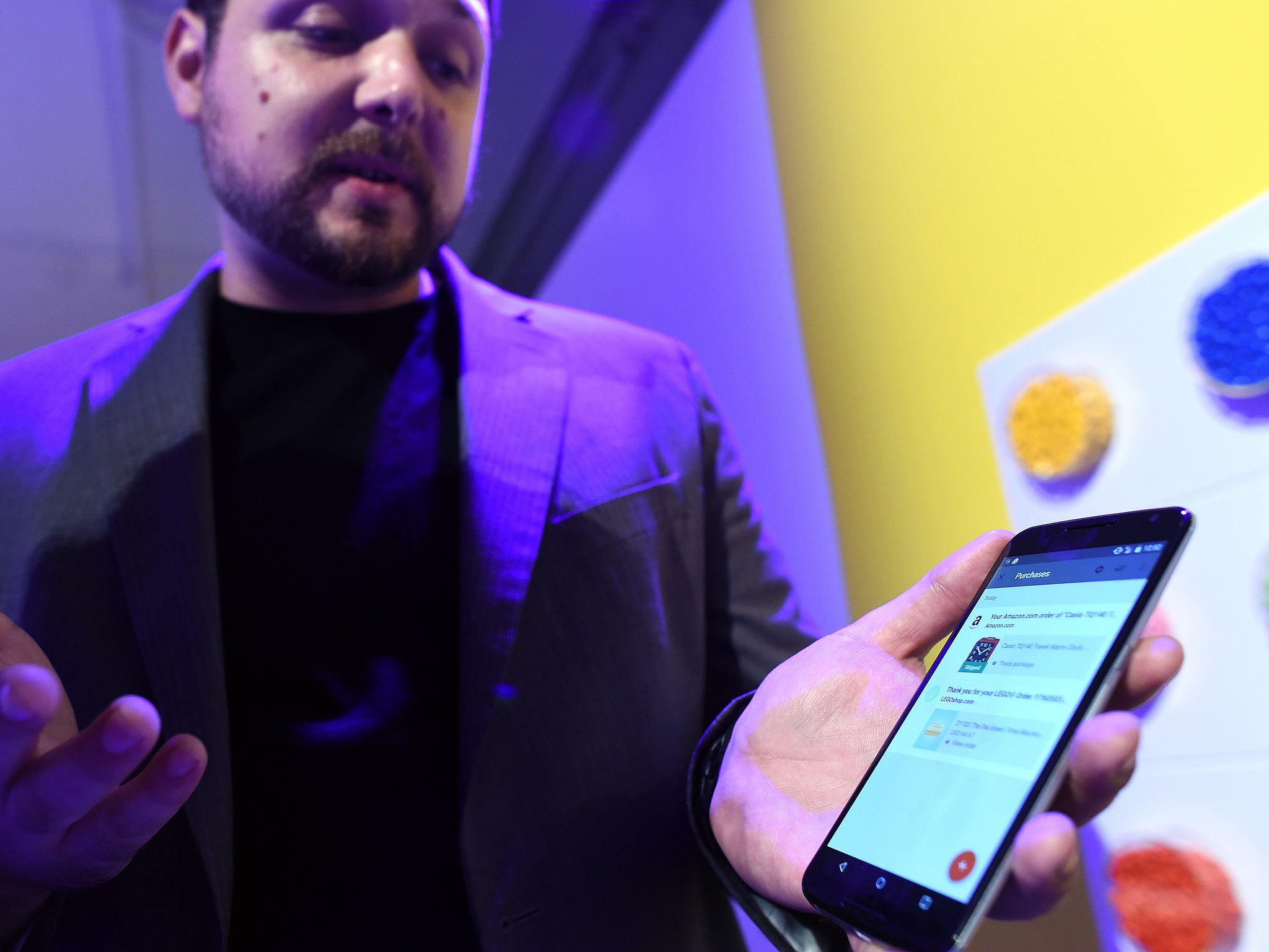 Google's lead designer for 'Inbox by Gmail' Jason Cornwell shows the app's functionalities on a nexus 6 android phone during a media preview in New York on October 29, 2014