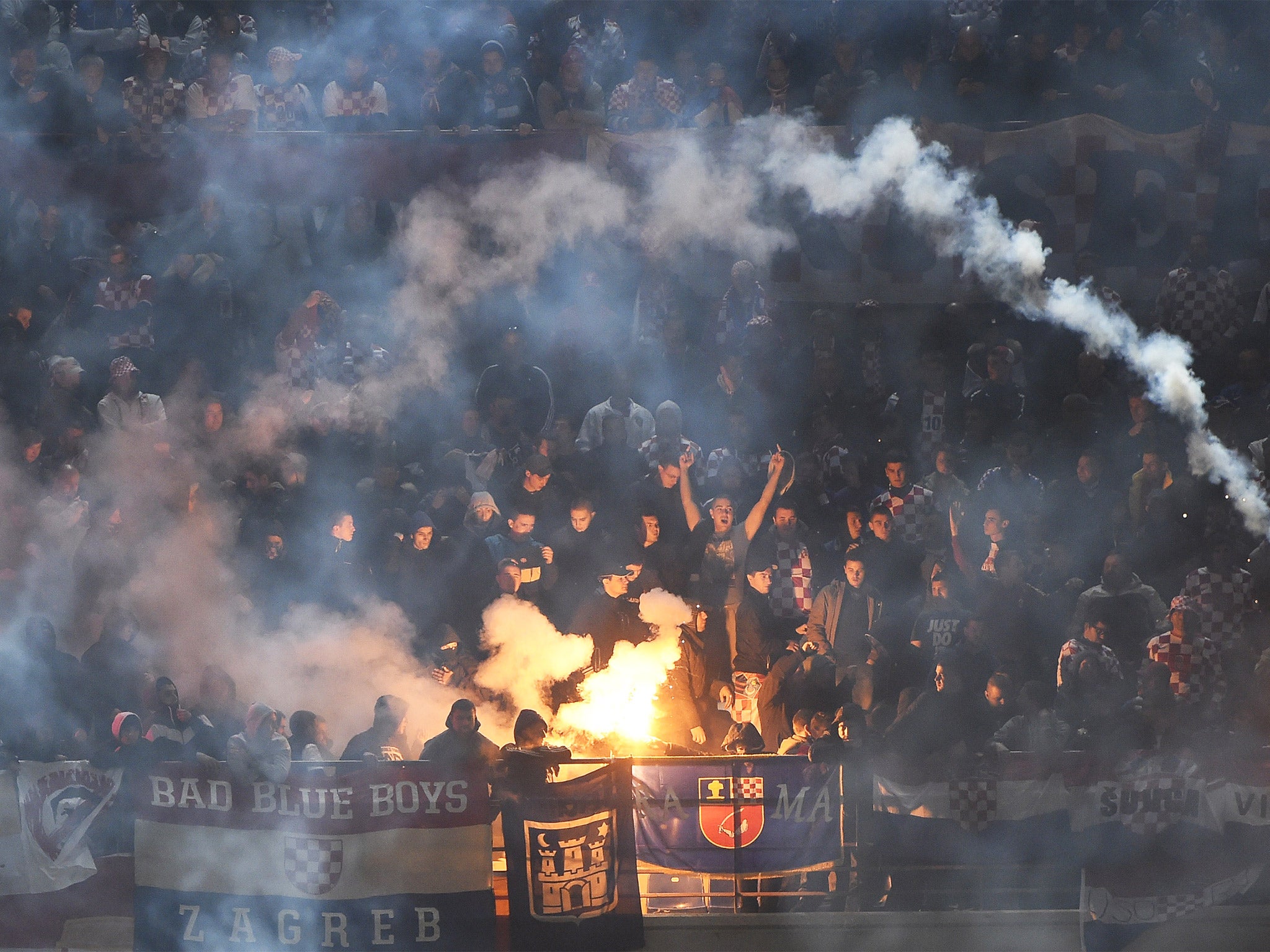 Croatia’s supporters throw flares during the Euro 2016 qualifying football match against Italy. File photo