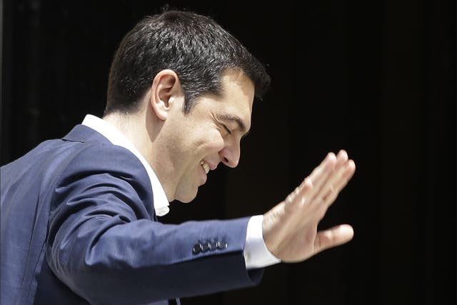 Prime Minister Alexis Tsipras puts on a brave face 