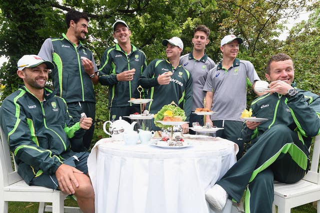 The Australian cricket squad enjoy afternoon tea at Kensington Roof Gardens in London on Tuesday