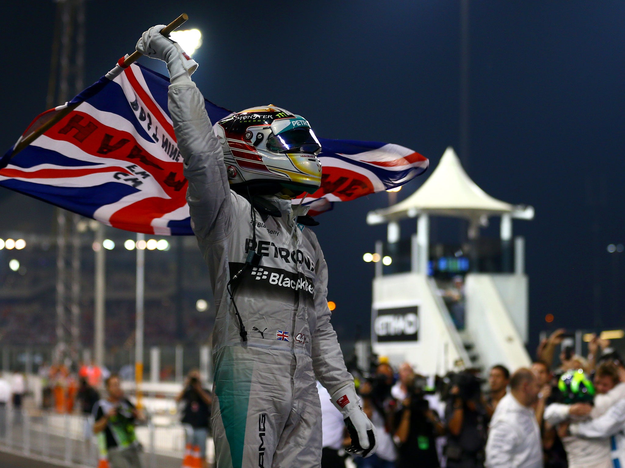 Lewis Hamilton celebrates winning the 2014 F1 world championship