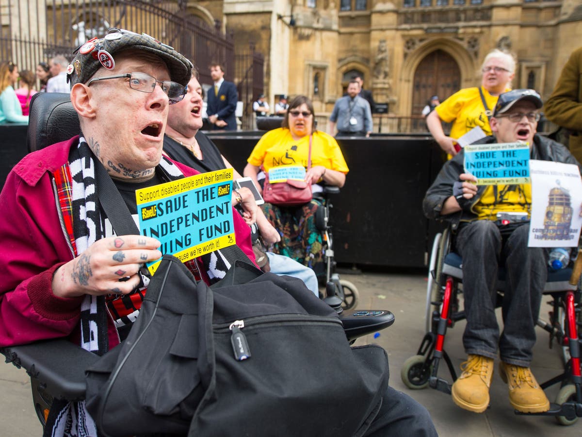 Police clash with disabled protesters as they try to storm House of ...
