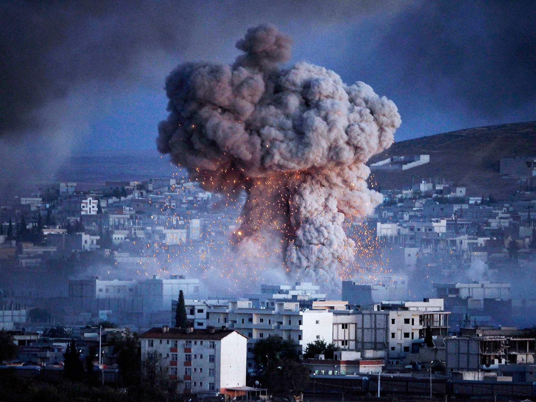 An explosion rocks Kobani during the siege