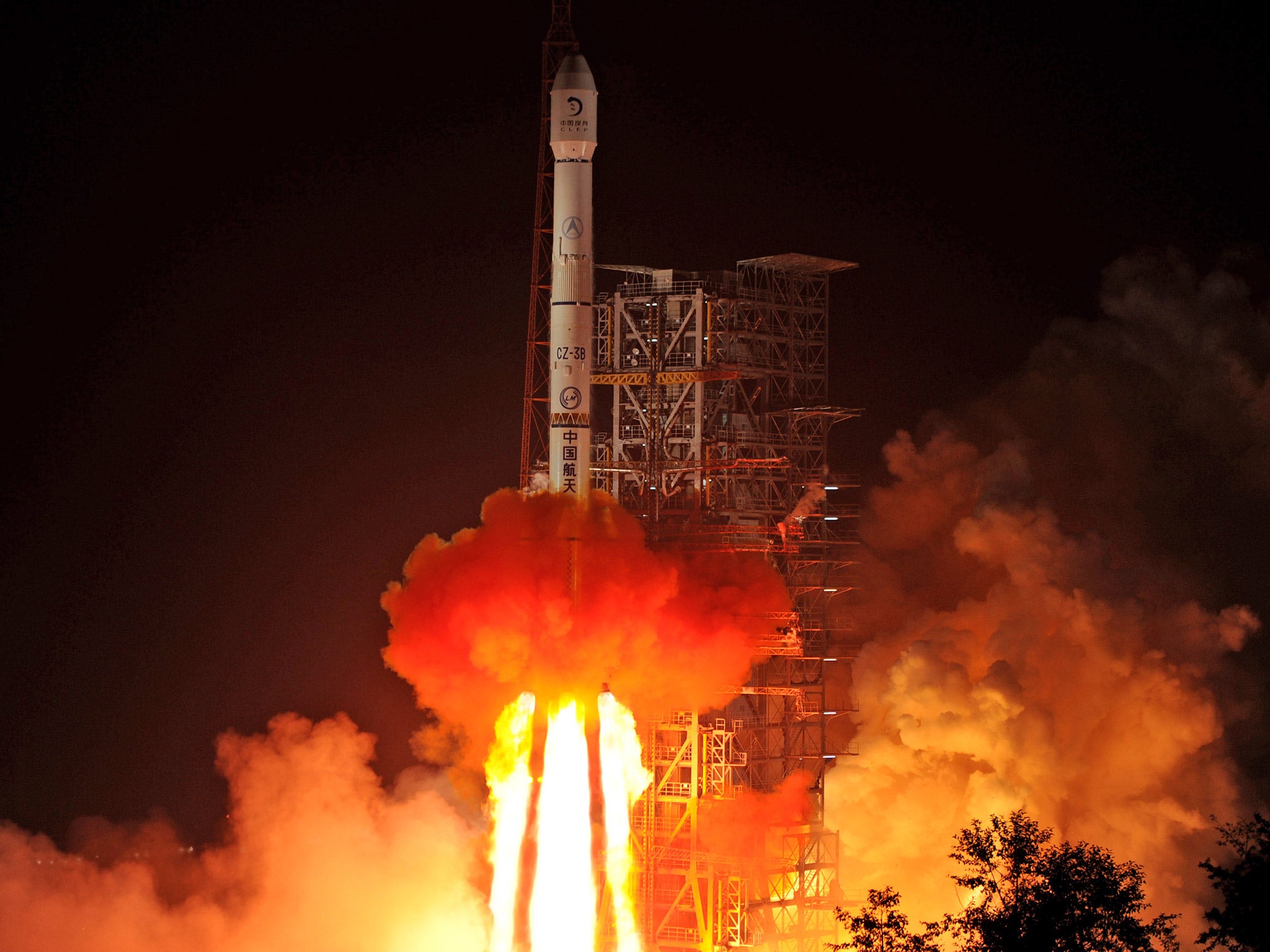 A Chinese rocket lifts off from the Xichang Satellite Launch Center in 2013. China insists that its space programme has peaceful purposes