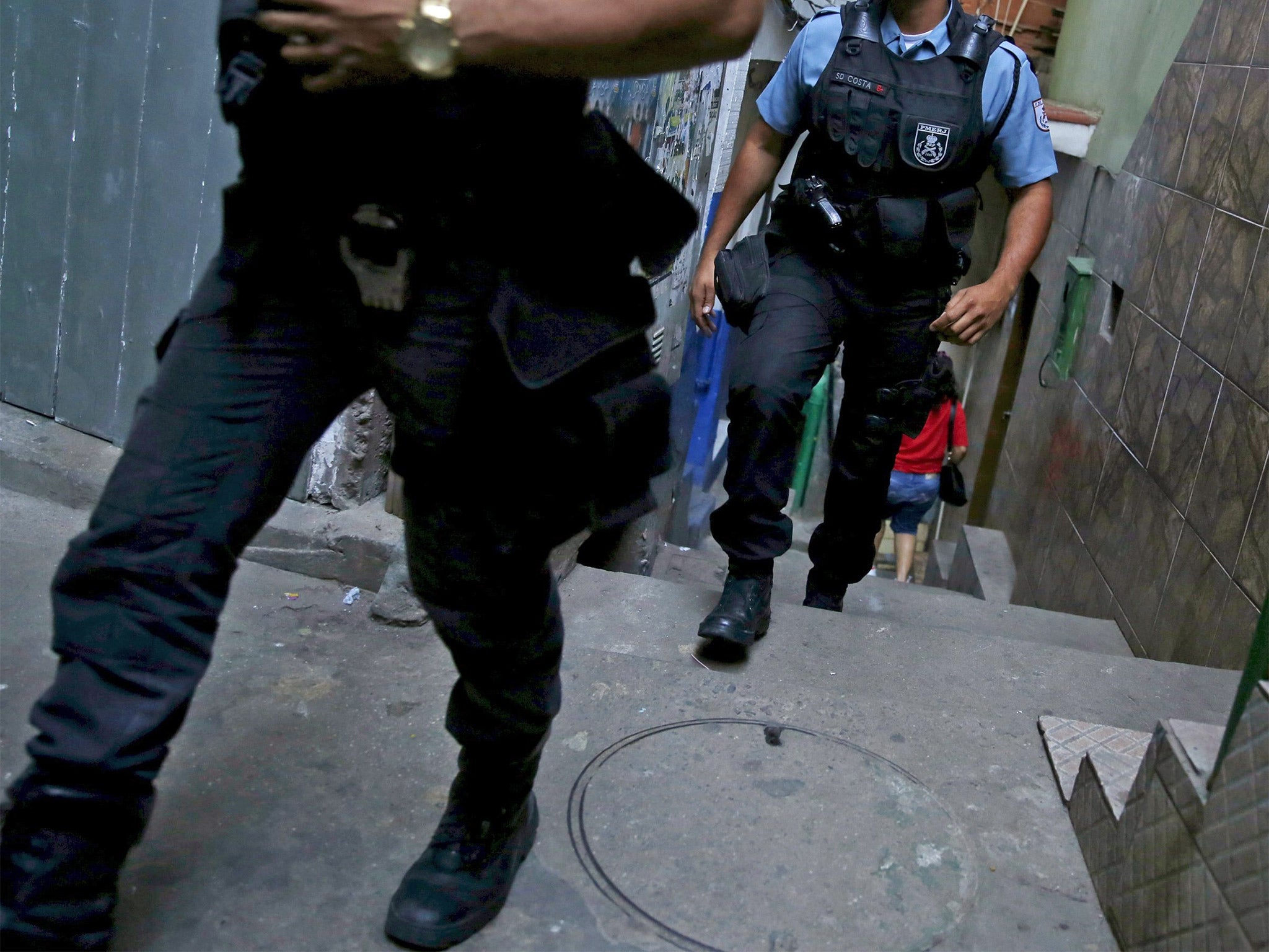 Police officers patrol a slum in Rio de Janeiro. File photo