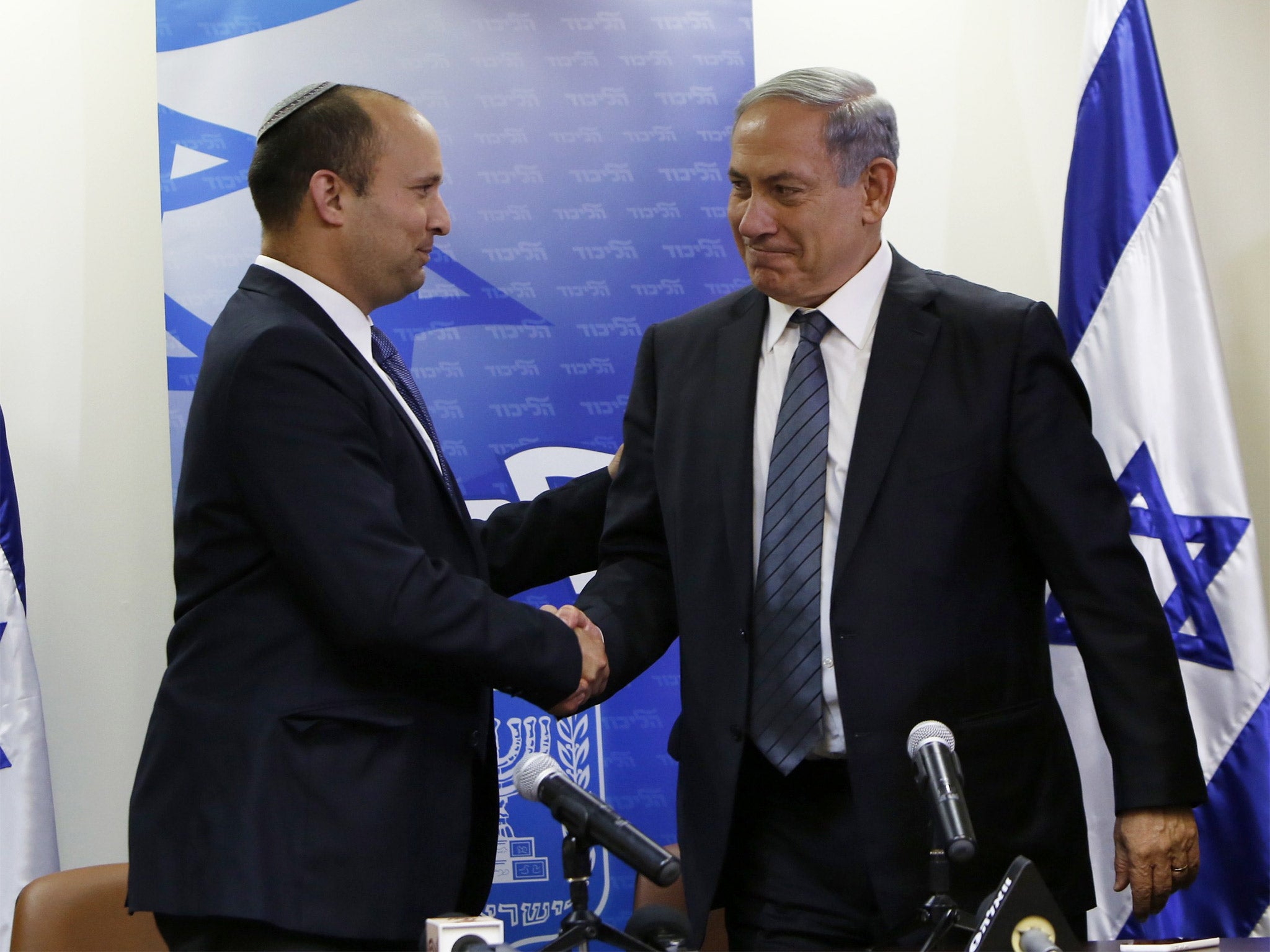 The Prime Minister Benjamin Netanyahu (right) with the head of the right-wing Jewish Home party, Naftali Bennett (Getty)