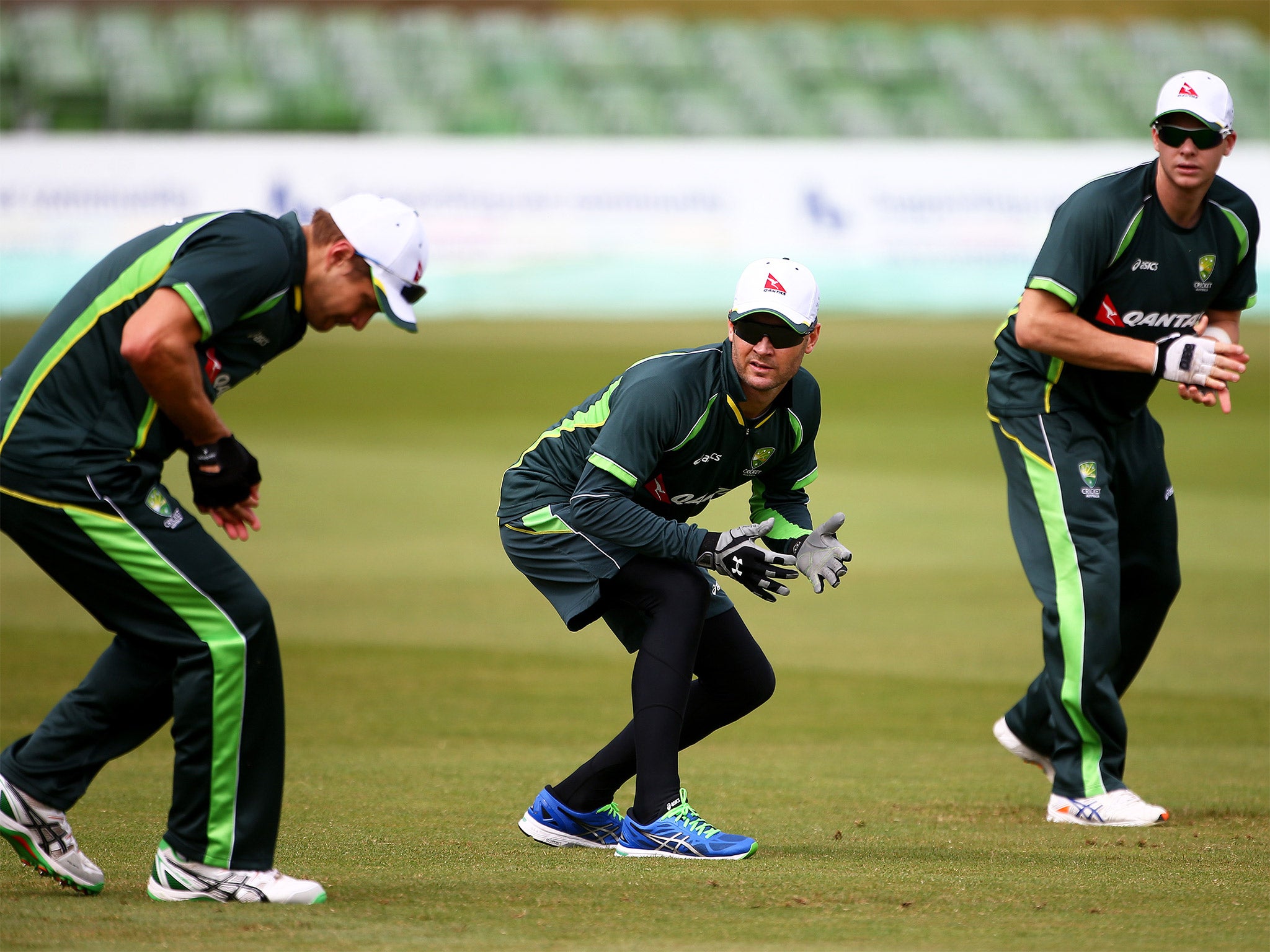 Michael Clarke (centre) watches as the Australians practise at Canterbury