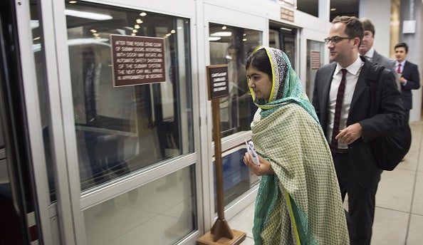 Malala boards the subway at the US Capitol after meeting with Rep. Nancy Pelosi yesterday on Capitol Hill in Washington, DC.