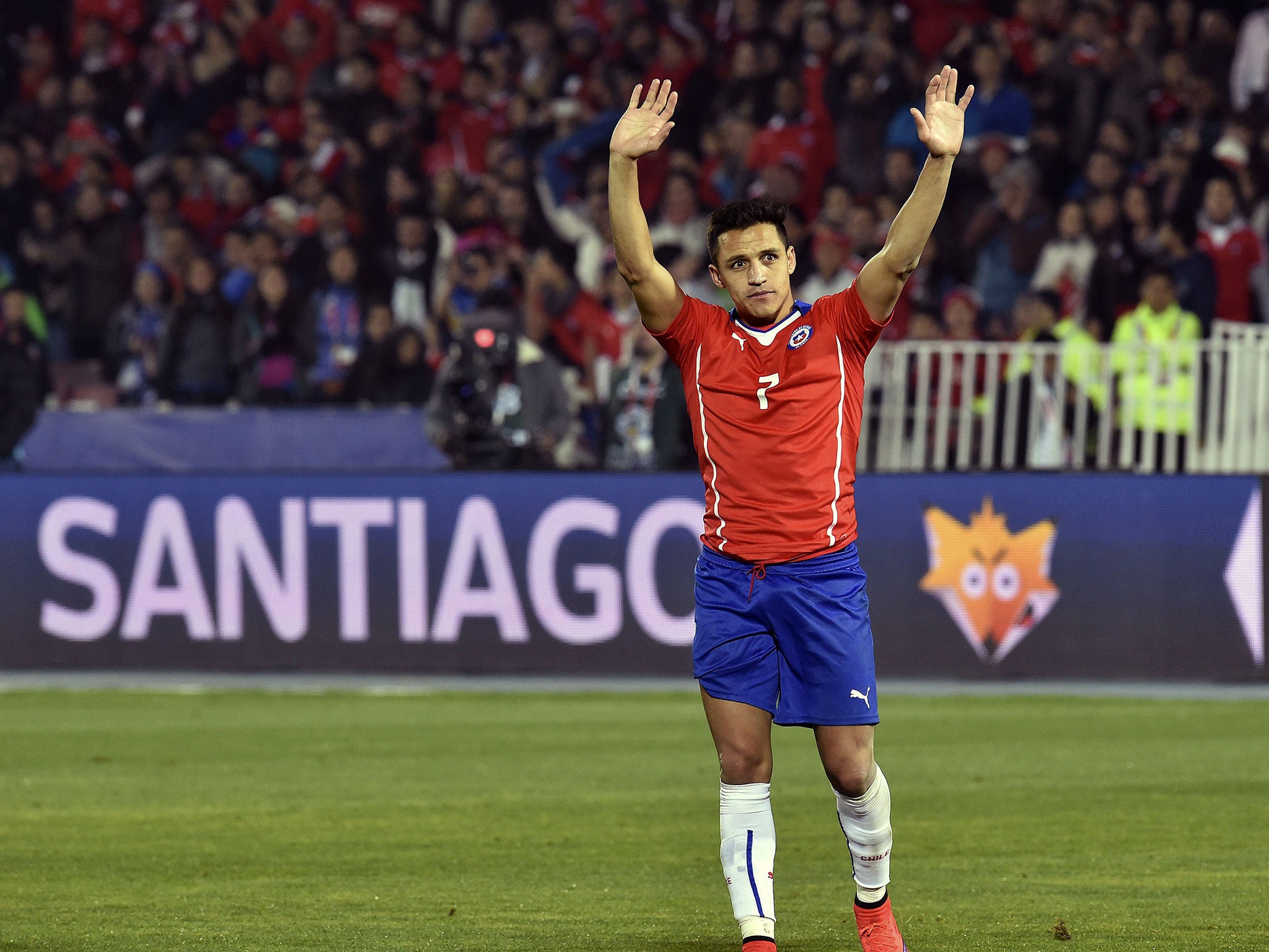 Alexis Sanchez waves the the Chilean
