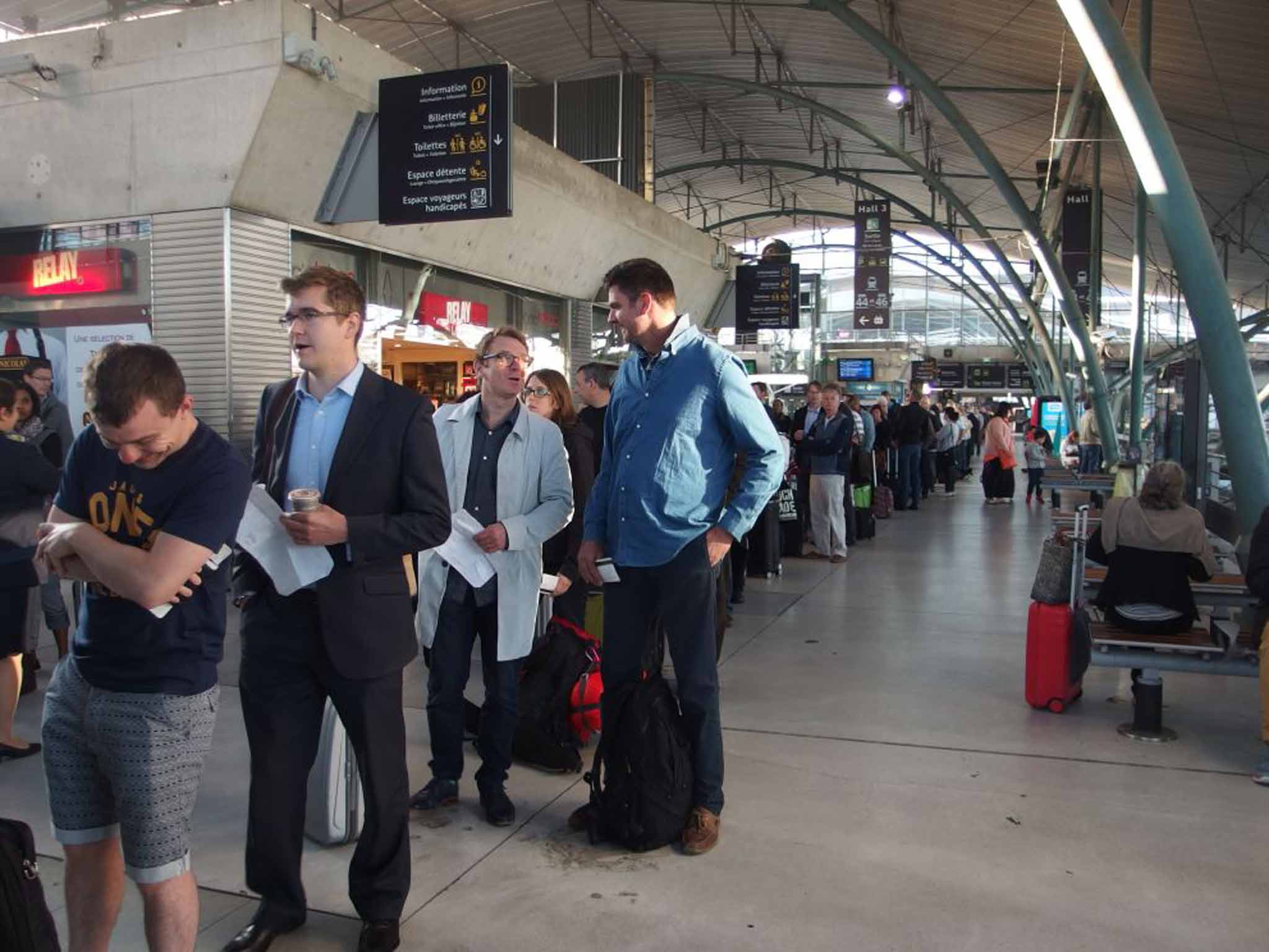 Lost in France: stranded: passengers wait for information at Lille Europe station