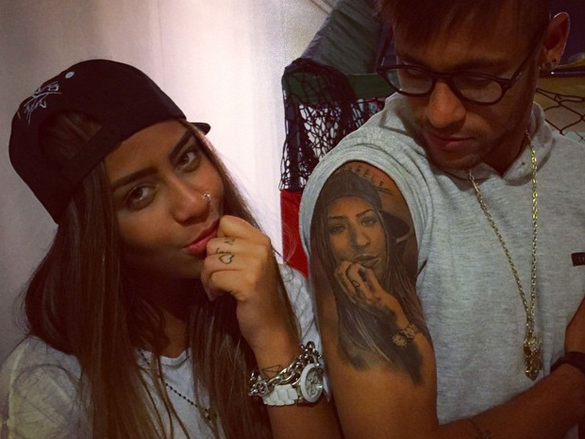 Neymar posted this picture showing his new tattoo with his sister to his Instagram page